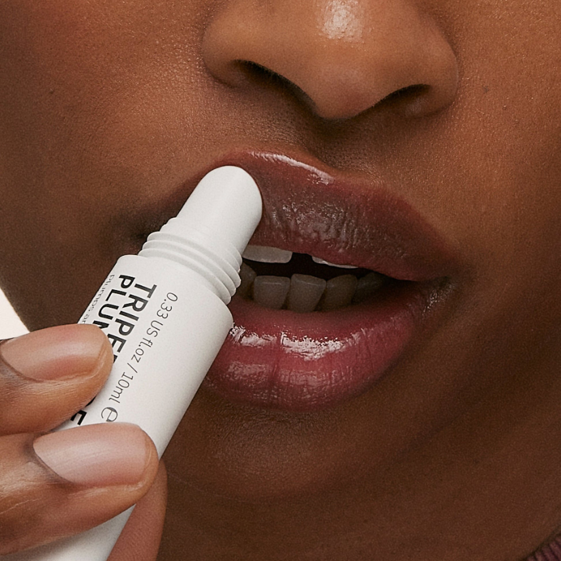 tripeptide-plumping-berry-lip-balm-a3 ApplicationBerry.jpg
